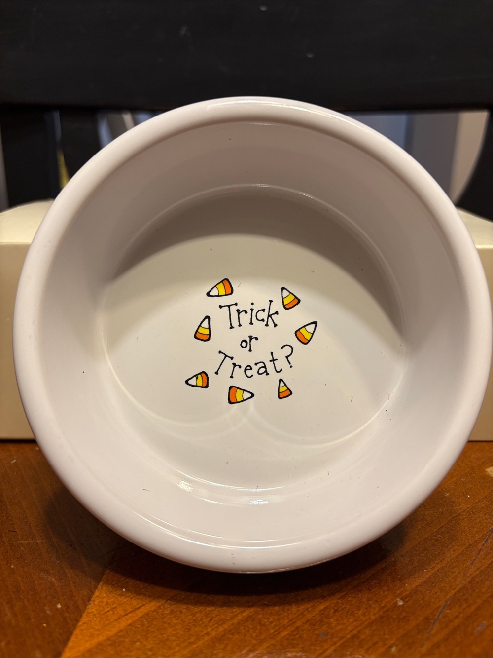White Ceramic Bowl with "Trick or Treat” design.